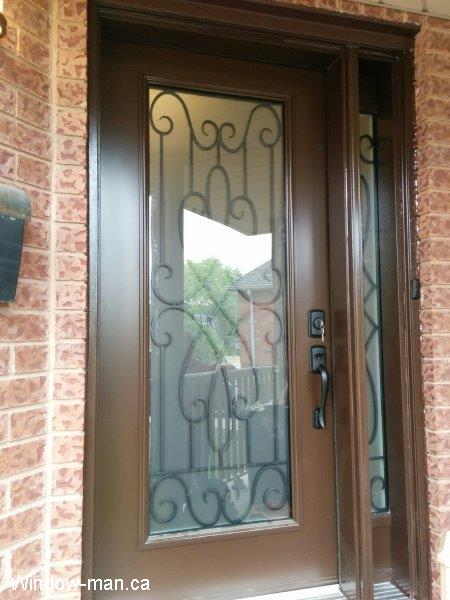 Steel insulated front entry door one sidelight. Brown. Full wrought iron glass. Nottingham wrought iron glass design